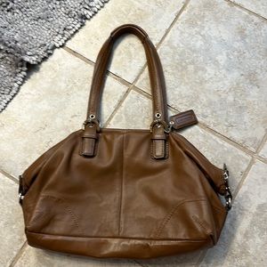 Brown leather coach purse